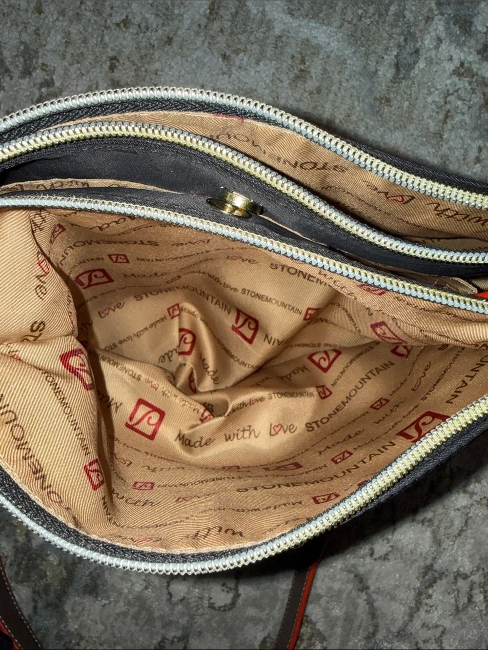 Stone Mountain Black Crossbody Bag with Red-orange and gold Trim Accents. New!